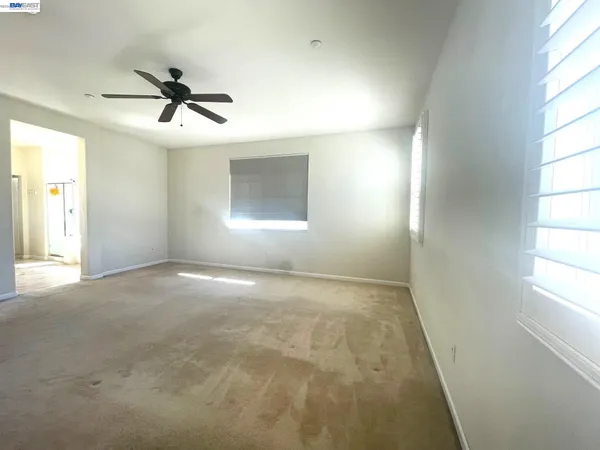 a large bathroom with a large tub and sink