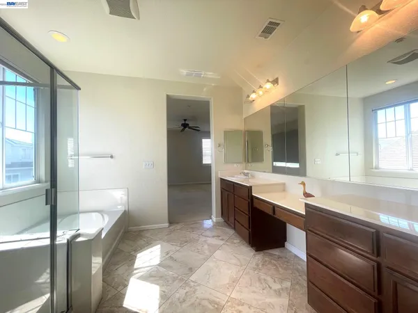 a bathroom with a sink and a bathtub