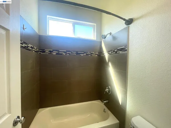 a view of a entertaining space in front of house