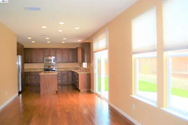 a bathroom with a shower and a mirror
