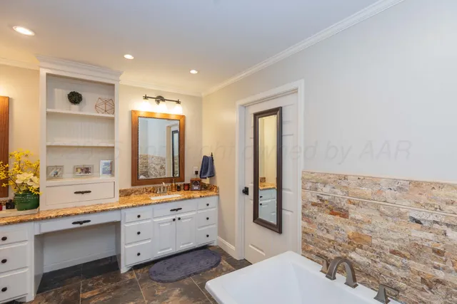 a view of yard with swimming pool and green space