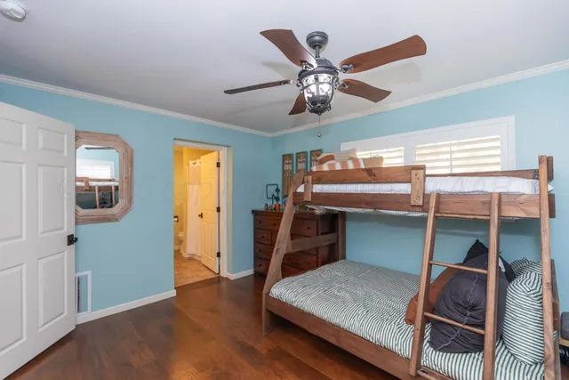 an aerial view of residential house with outdoor space and parking