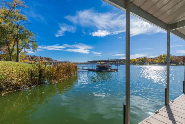 a kitchen with a stove a sink and a refrigerator