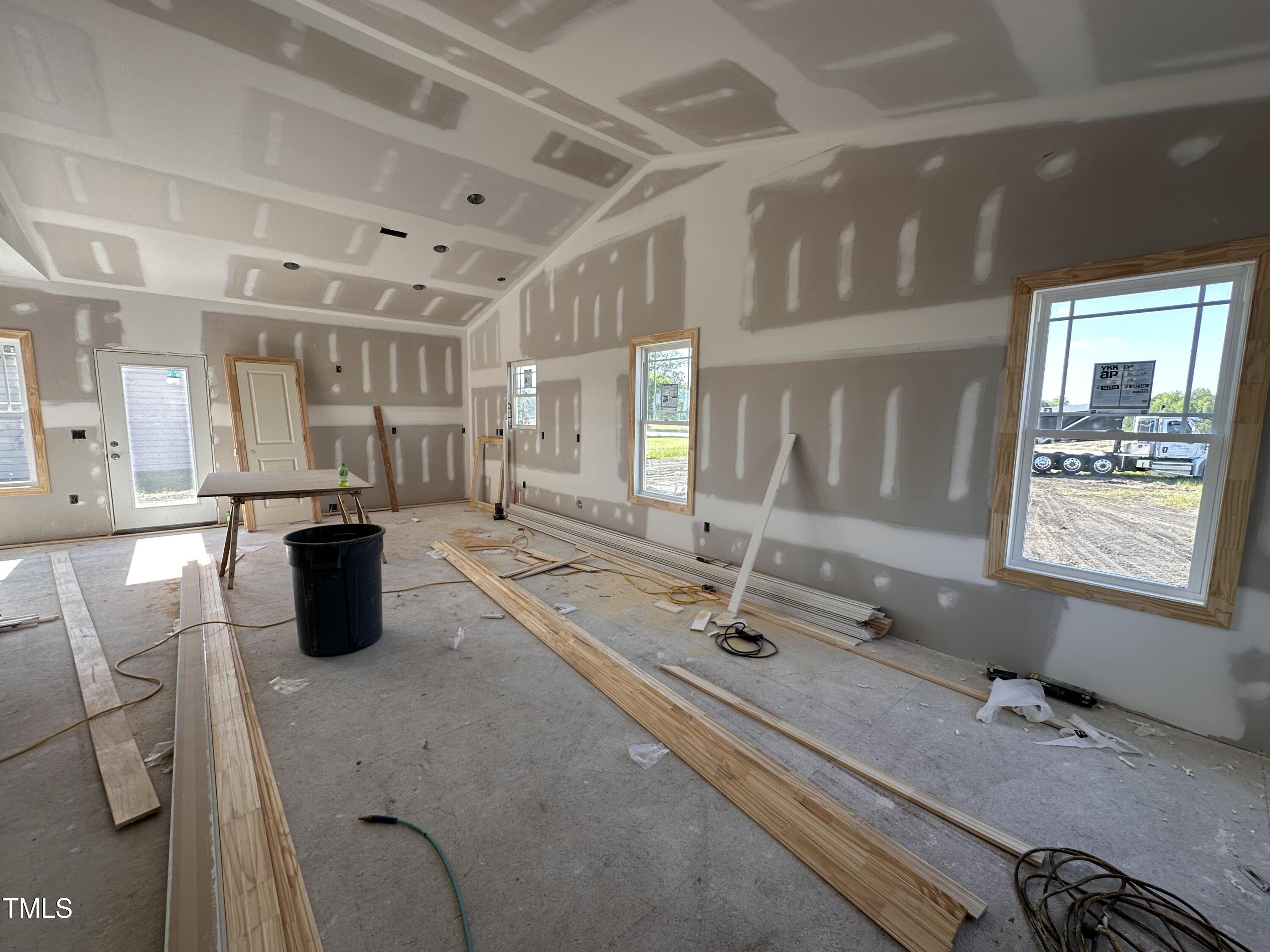 2895 Bakers Chapel Road Smithfield, NC 27577 - Photo 2 of 8 a bathroom with a double vanity sink and a mirror