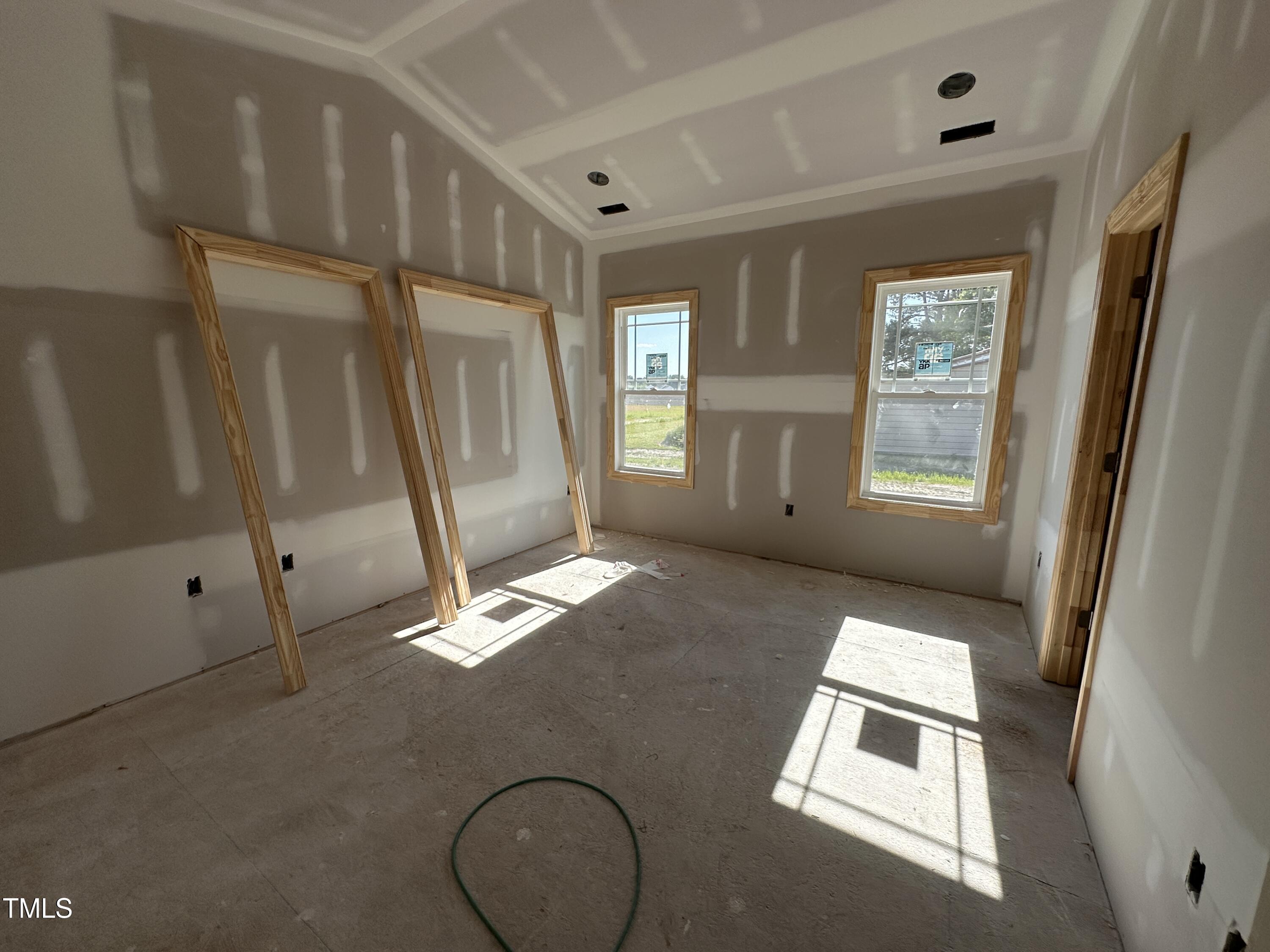 2895 Bakers Chapel Road Smithfield, NC 27577 - Photo 4 of 8 a view of livingroom with hardwood floor and window