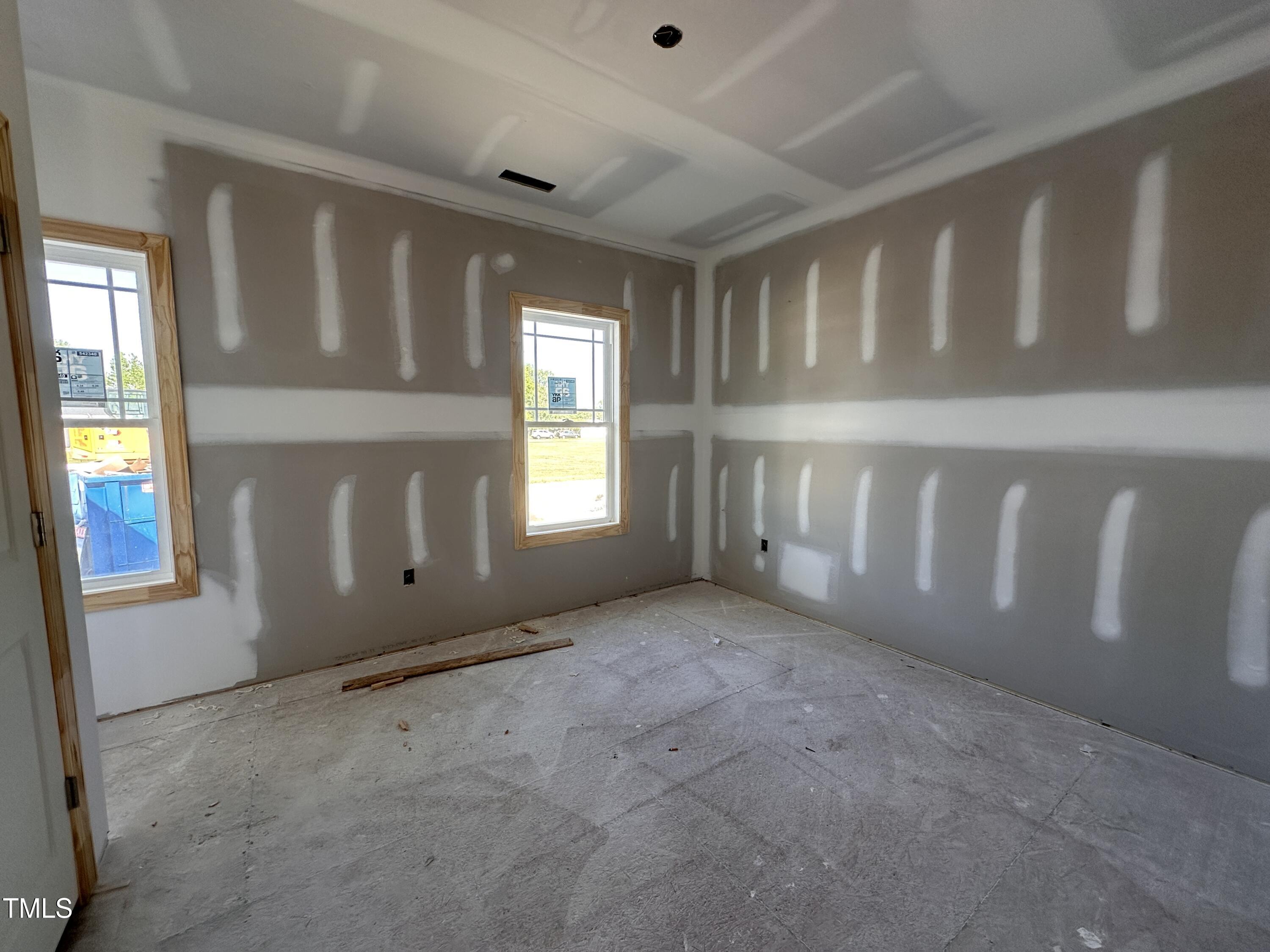 2895 Bakers Chapel Road Smithfield, NC 27577 - Photo 8 of 8 a view of an empty room with a window
