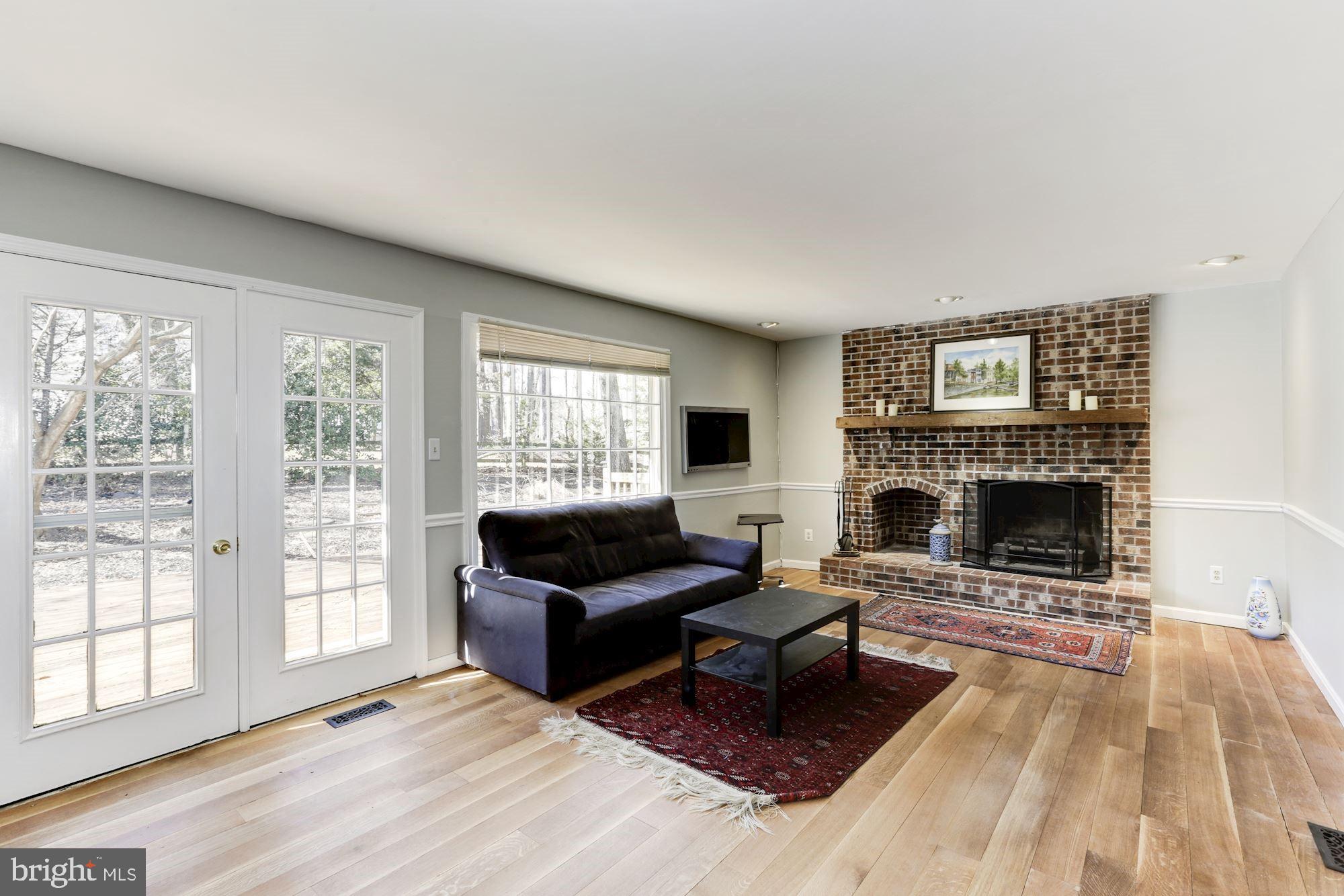 1592 Stowe Road Reston, VA 20194 - Photo 13 of 28 Family Room with Wood Burning Fireplace