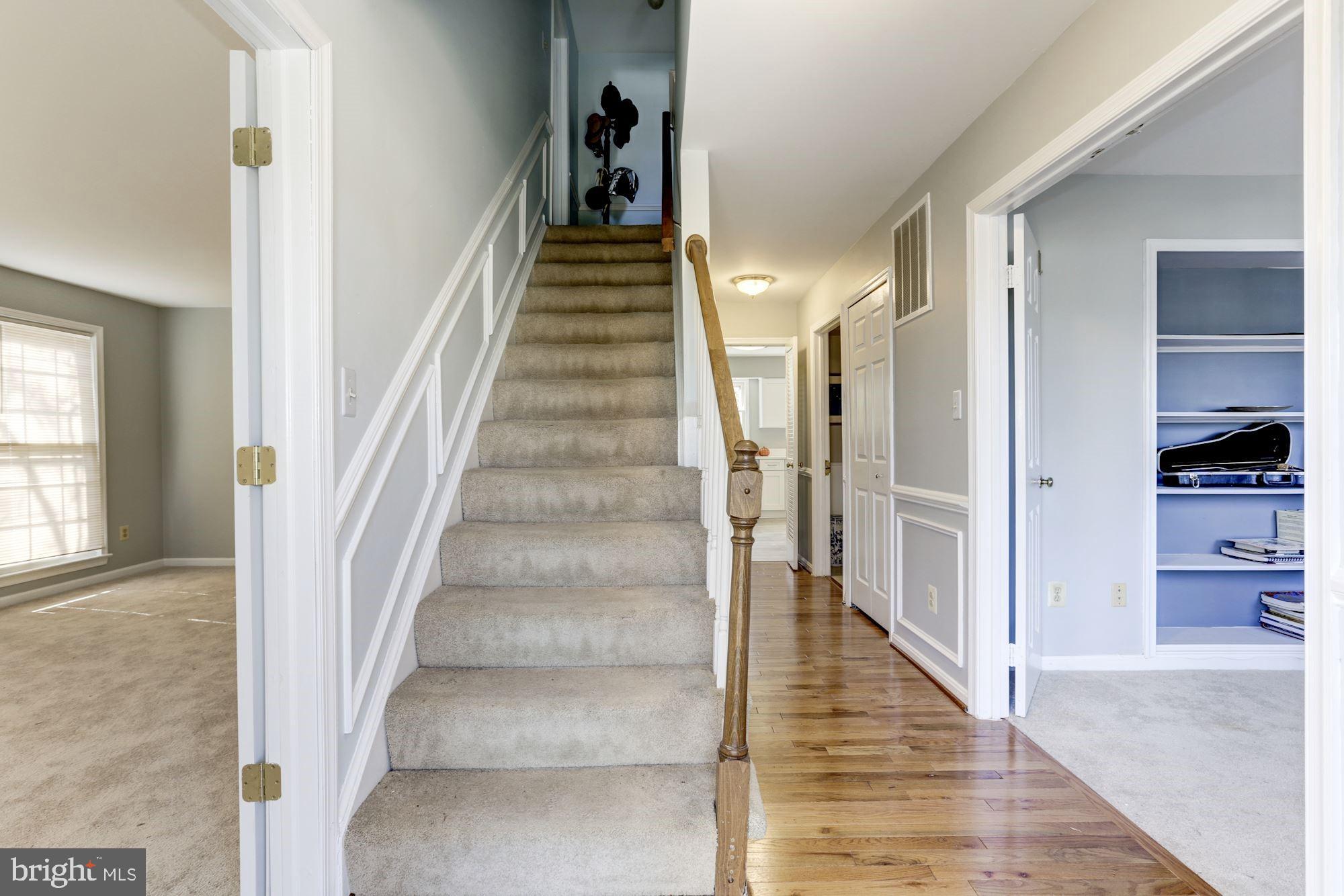 1592 Stowe Road Reston, VA 20194 - Photo 16 of 28 Staircase from hardwood foyer and hall