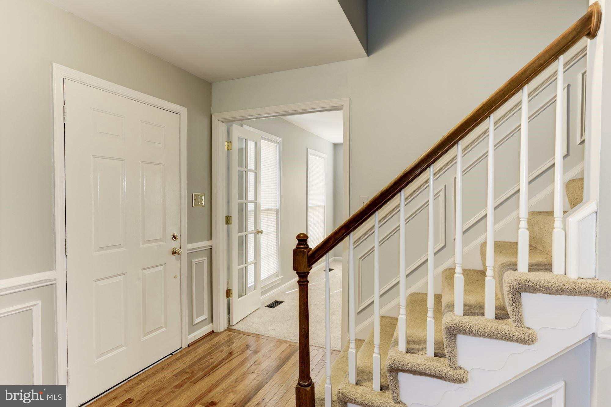 1592 Stowe Road Reston, VA 20194 - Photo 4 of 28 Hardwood foyer off Living Room & Study