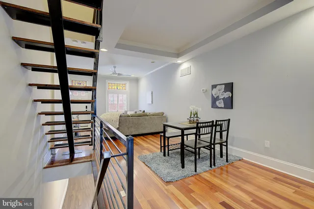 a view of a livingroom and dining room