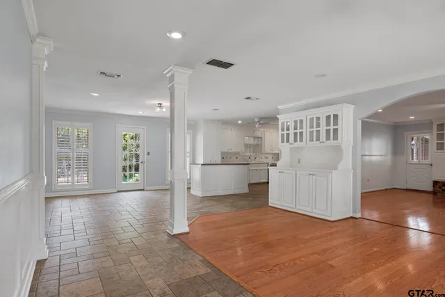 a view of a kitchen with a sink and a stove top oven