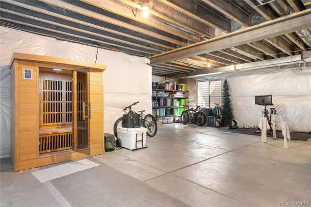a view of a patio with table and chairs and potted plants