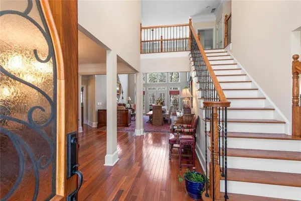 a view of a hallway with windows
