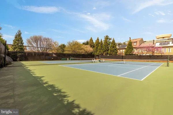 a view of an outdoor space and tennis court