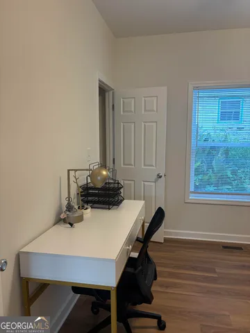 a table and chairs in a room