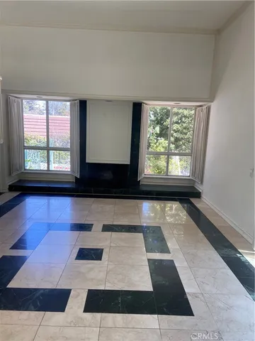 a kitchen with a stove a refrigerator and a sink