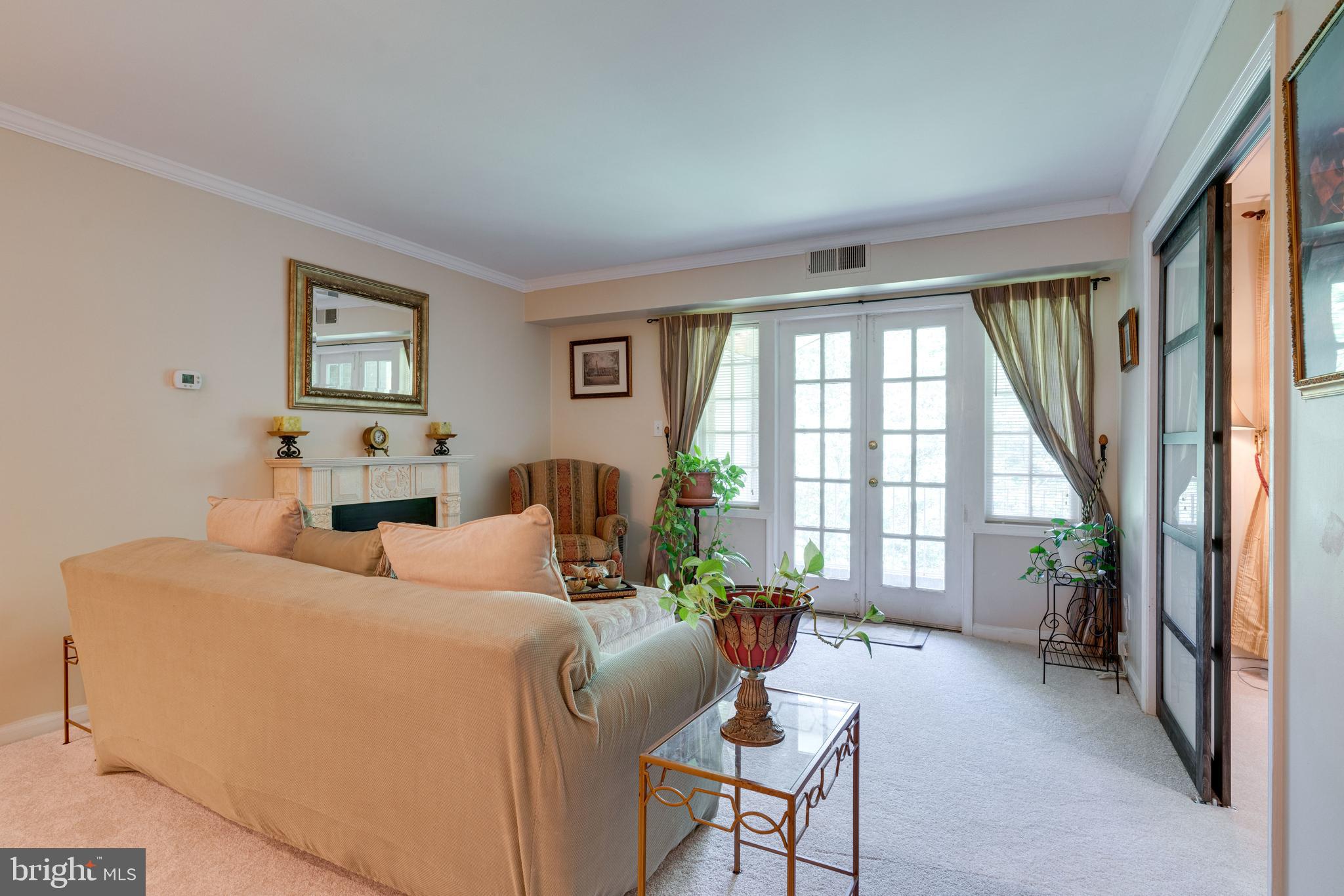 5905 Bayshire Road, Unit 184 Springfield, VA 22152 - Photo 9 of 48 living room w/ french doors to balcony