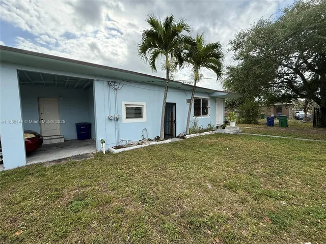 a house view with a garden space