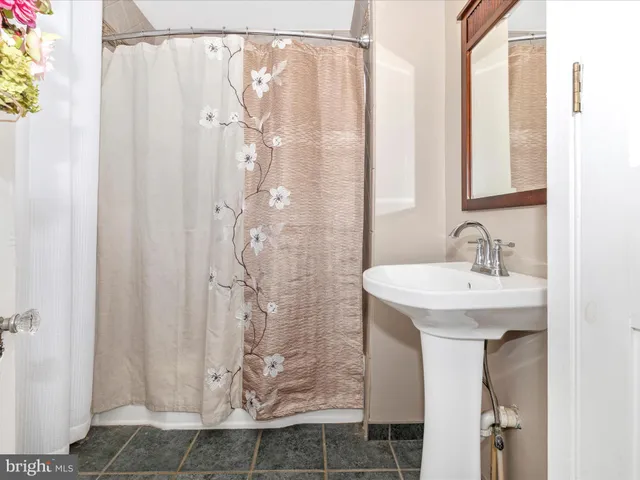 a view of a livingroom with furniture and a fireplace