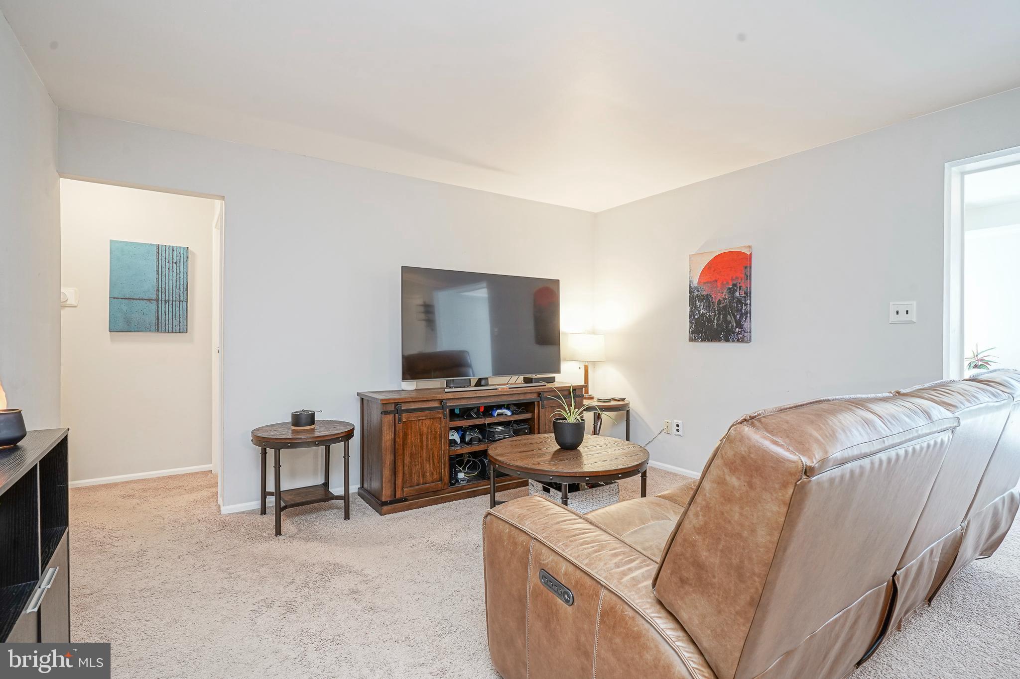 5 Kent Place Sewell, NJ 08080 - Photo 15 of 28 a living room with furniture and a flat screen tv