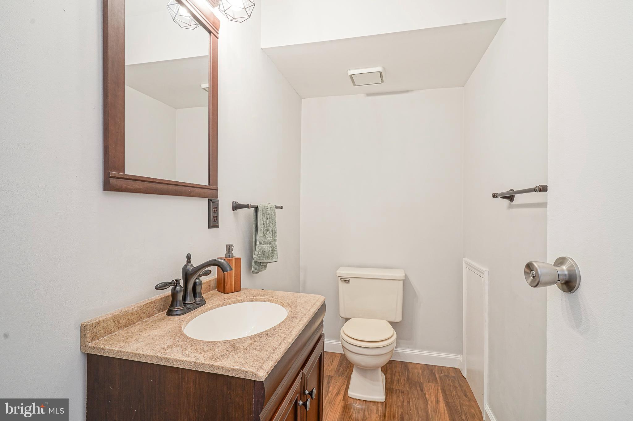 5 Kent Place Sewell, NJ 08080 - Photo 17 of 28 a bathroom with a sink vanity mirror and toilet