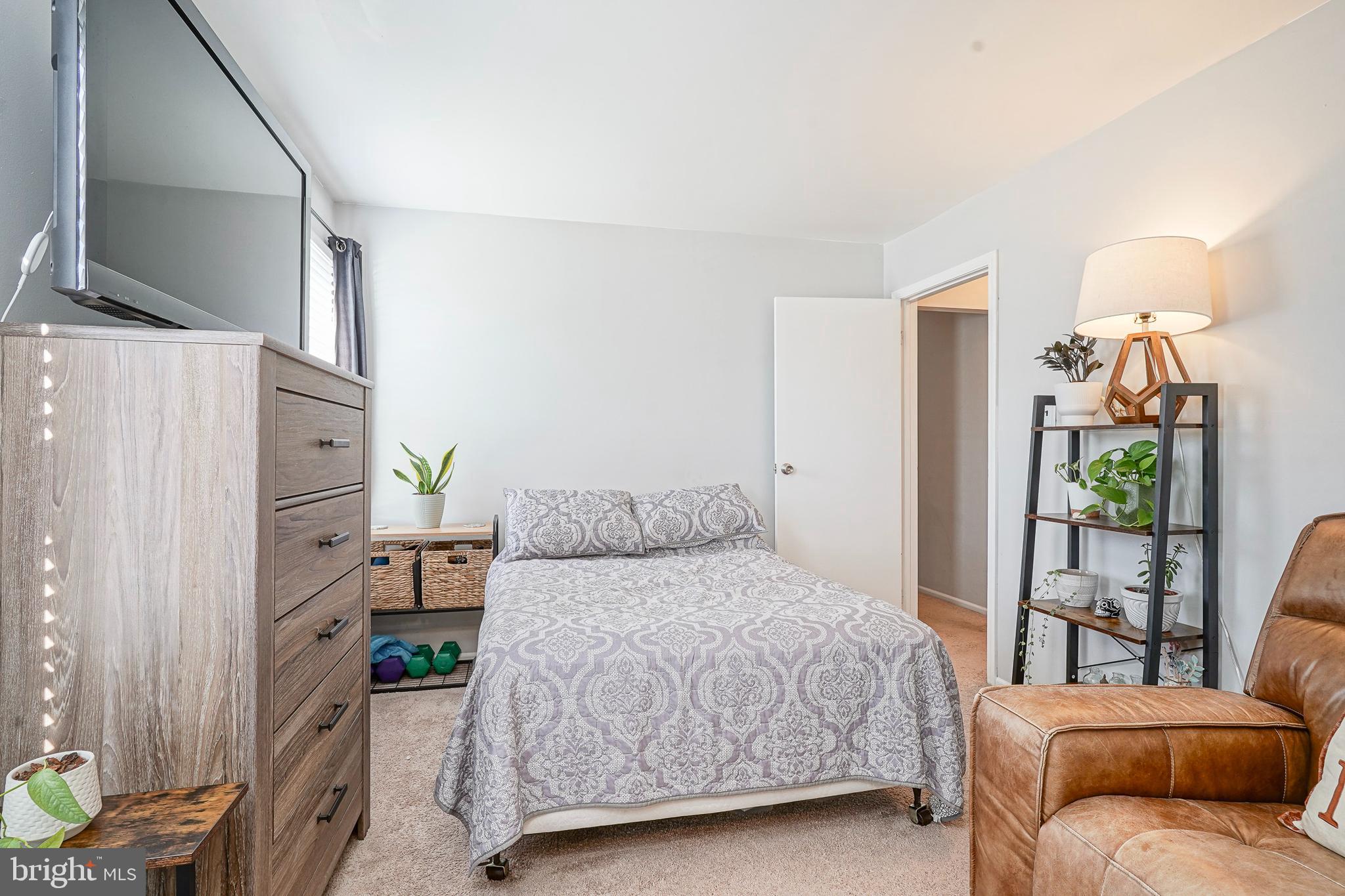 5 Kent Place Sewell, NJ 08080 - Photo 25 of 28 a bedroom with a bed and a couch