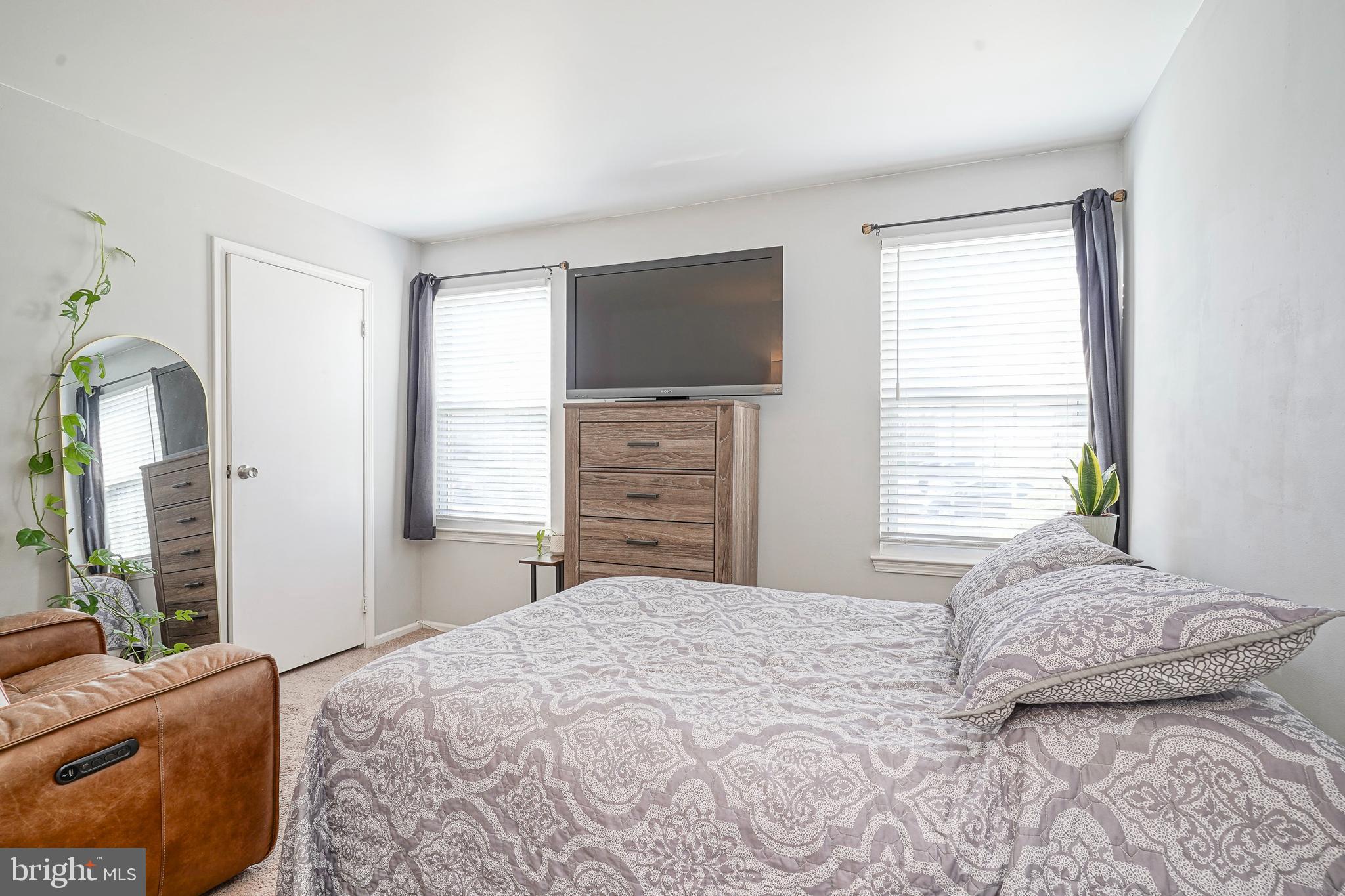 5 Kent Place Sewell, NJ 08080 - Photo 27 of 28 a bedroom with a bed and a flat screen tv