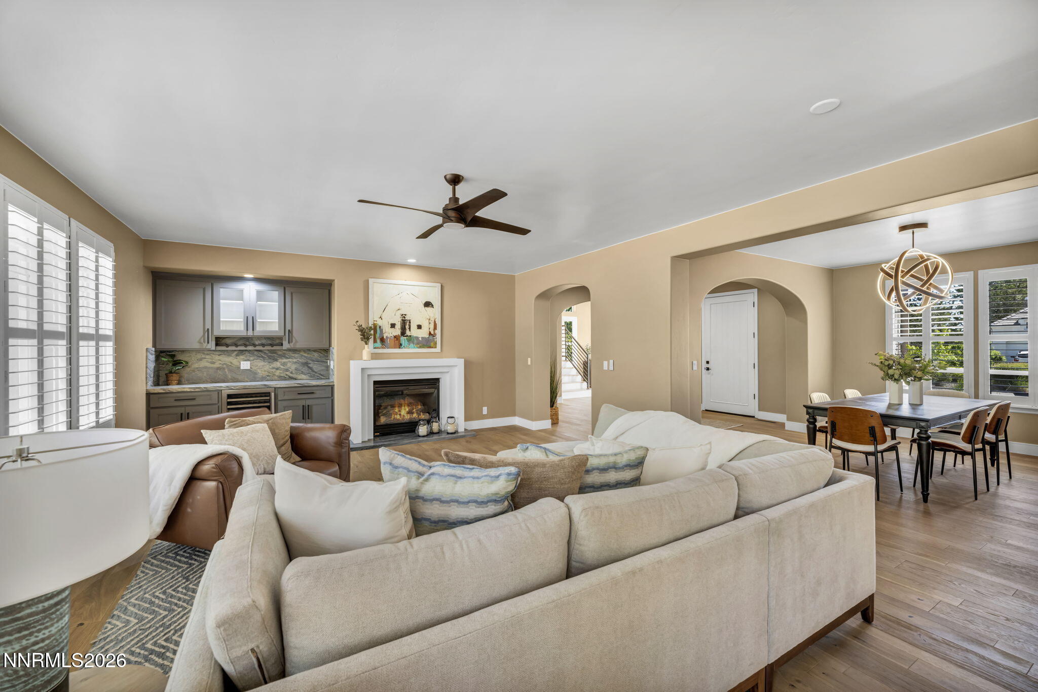 2965 Roundrock Court Reno, NV 89511 - Photo 10 of 40 a living room with furniture a fireplace and a flat screen tv