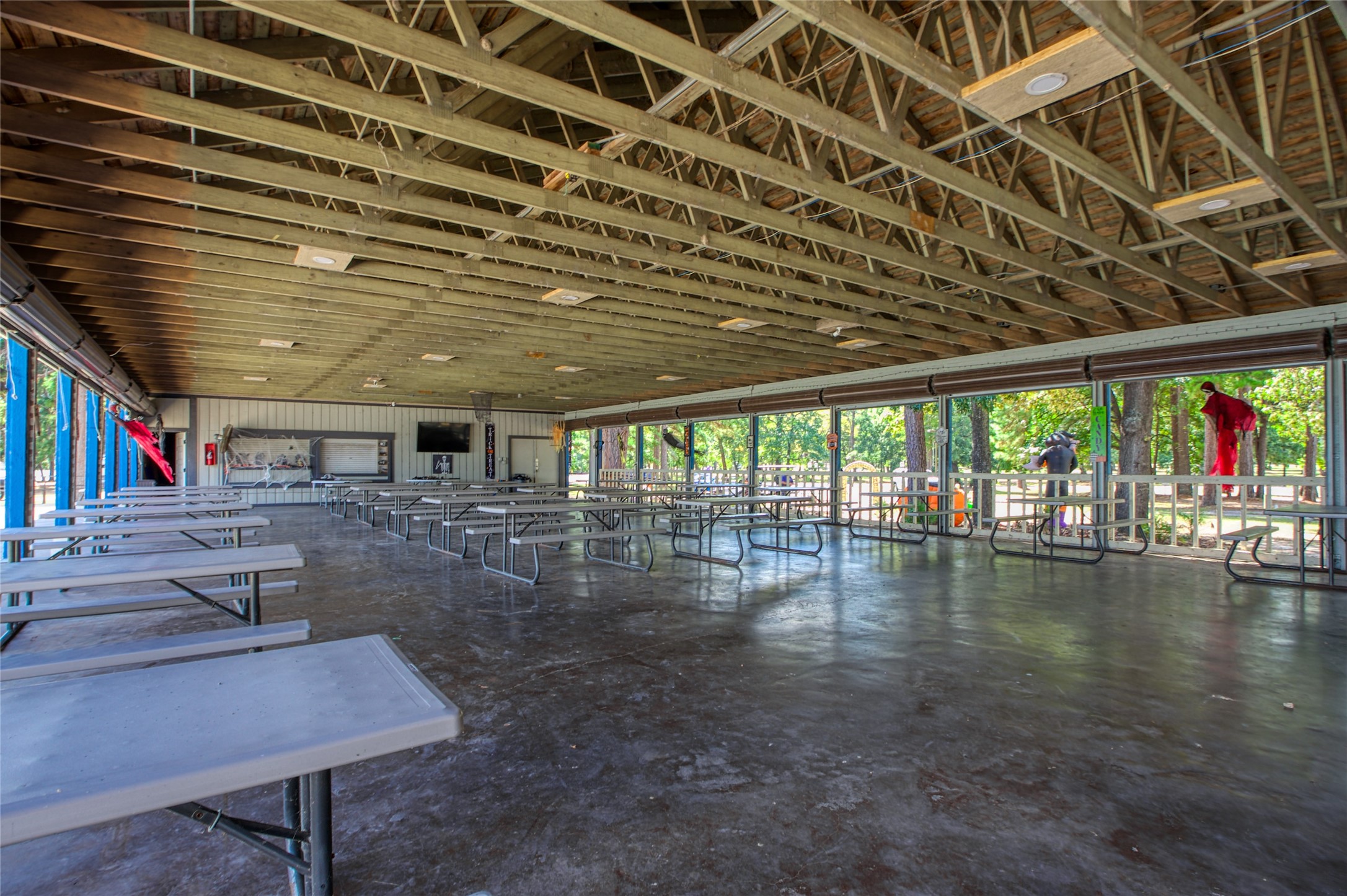 89 Heatley Street Trinity, TX 75862 - Photo 44 of 49 a roof deck with table and chairs and potted plants
