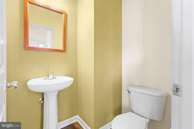 a bathroom with a sink and a toilet