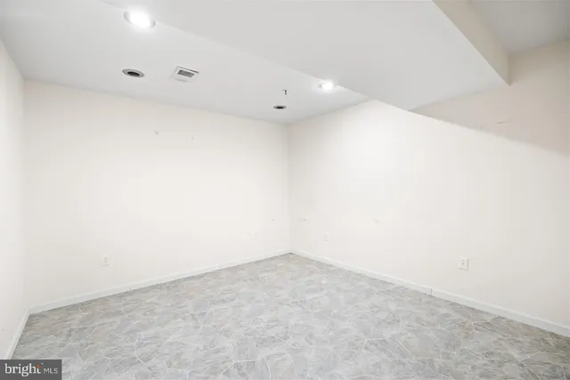 an empty room with a workbench