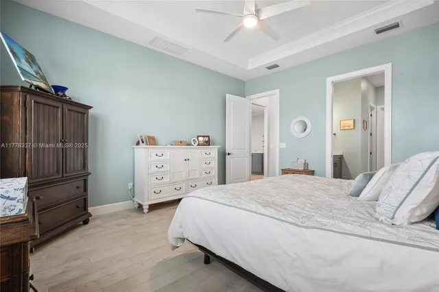 a bedroom with a bed and furniture