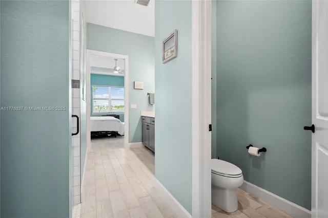 a bathroom with a toilet and a sink