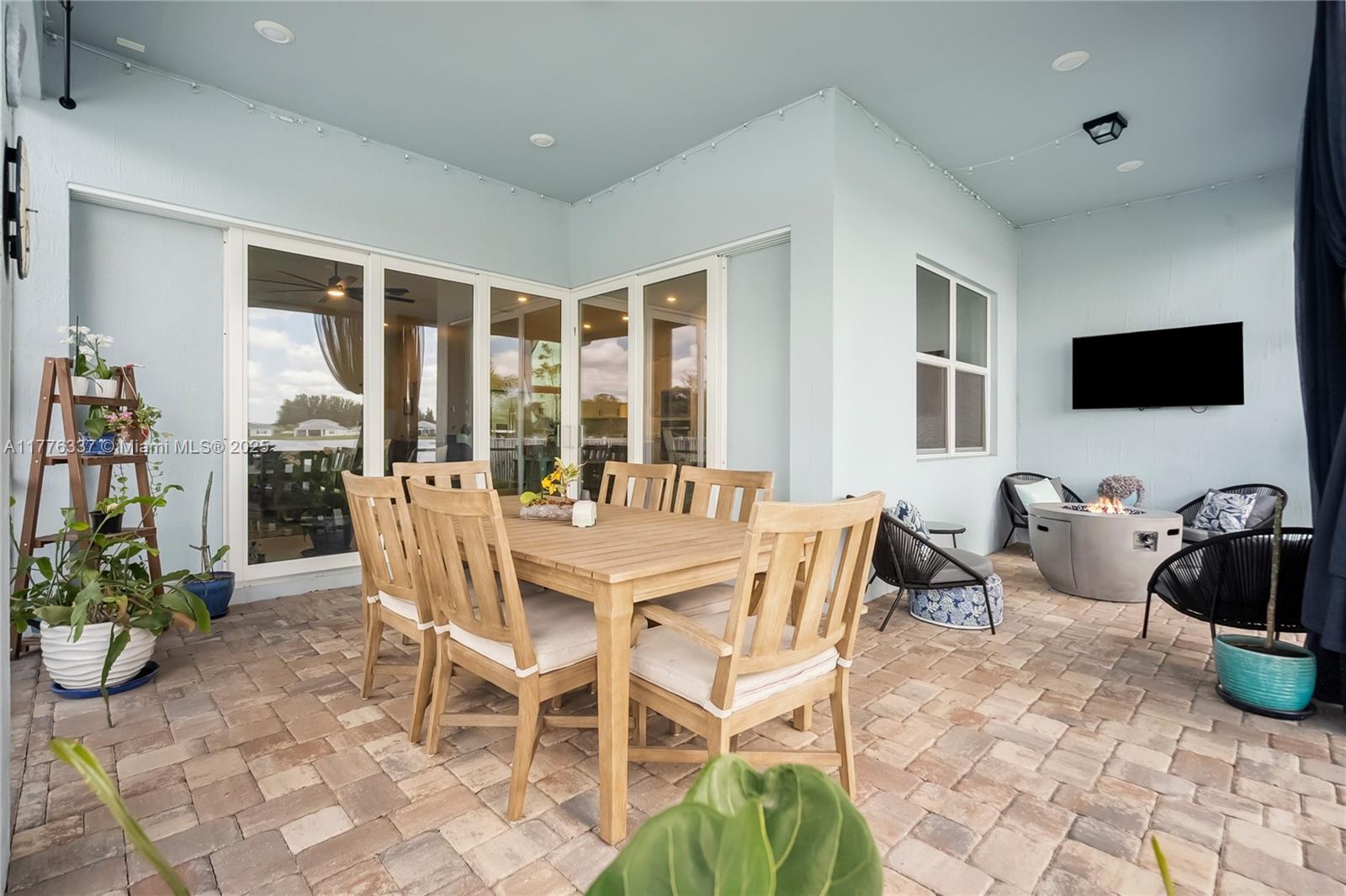 9734 Southwest Meridian Way Stuart, FL 34997 - Photo 35 of 48 a view of a dining room with furniture