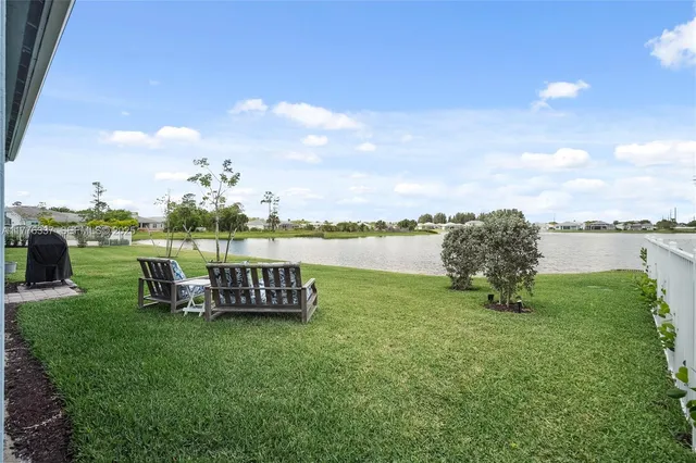 a view of a garden with outdoor seating