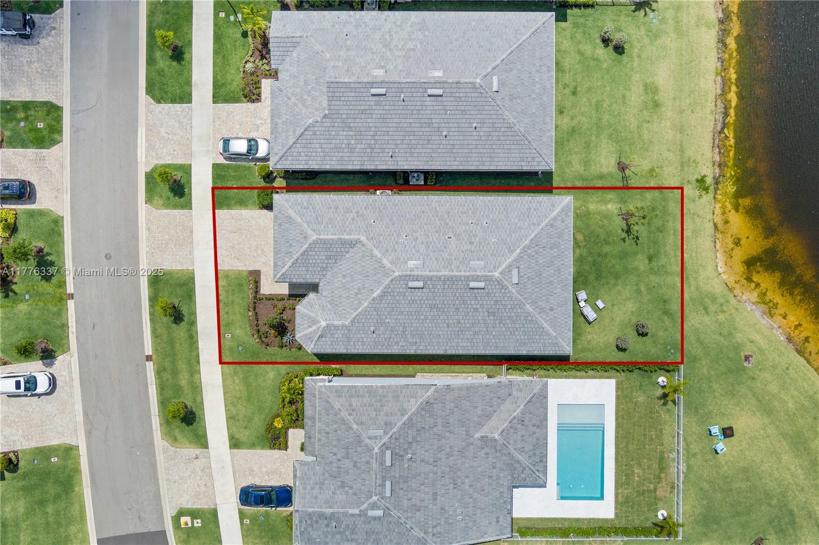 9734 Southwest Meridian Way Stuart, FL 34997 - Photo 44 of 48 an aerial view of a house with a yard