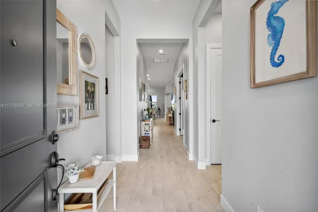 view of living room with furniture and entryway