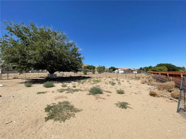 a view of snow covered with snow in the background