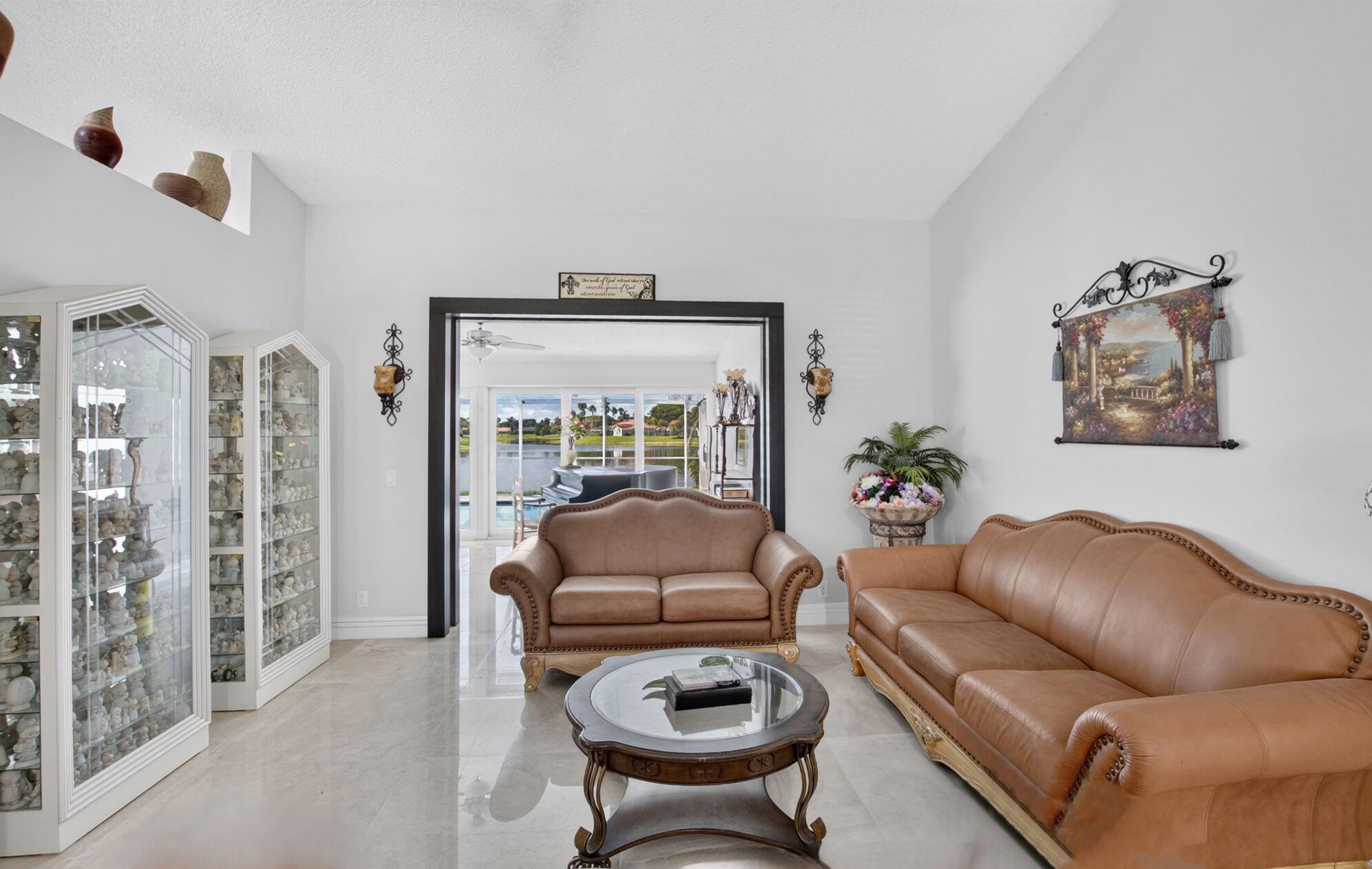 11845 Island Lakes Lane Boca Raton, FL 33498 - Photo 18 of 78 Living room view to pool & lake
