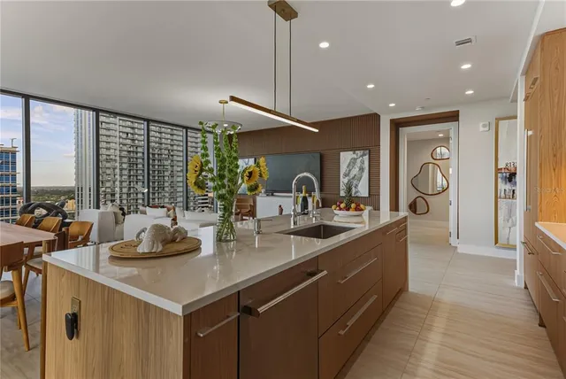 a dinning table and chairs in a room