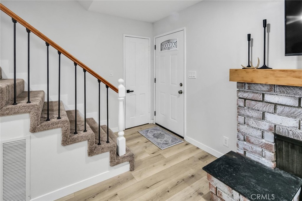 377 Hillside Road Lake Arrowhead, CA 92352 - Photo 2 of 33 a view of a bathroom with sink and mirror