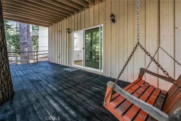 a backyard of a house with lots of trees