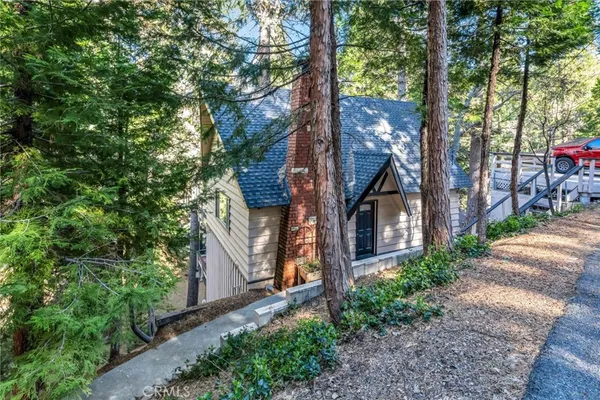 a view of house with outdoor space