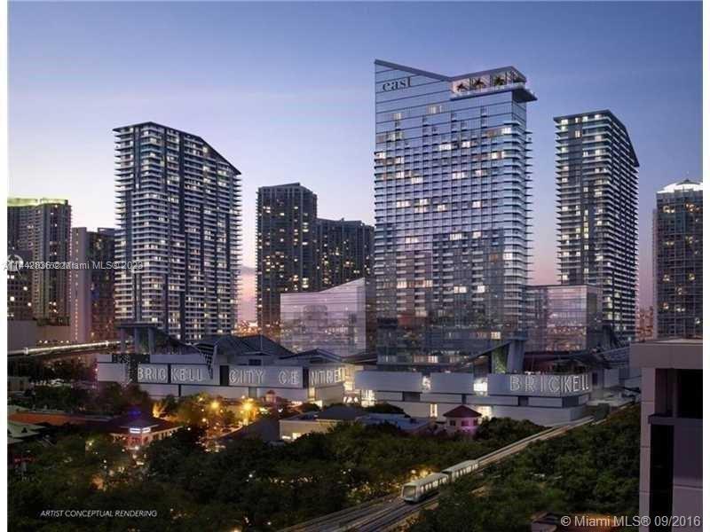 a view of a city with tall buildings
