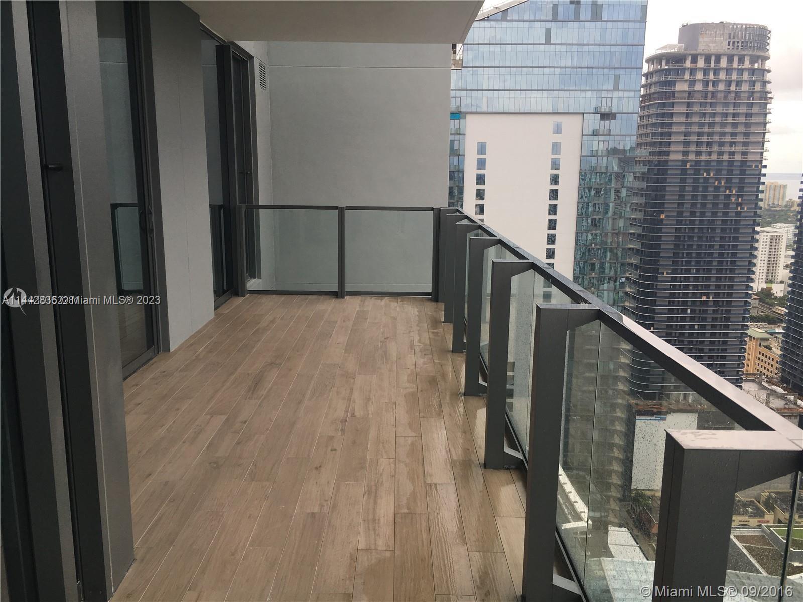 68 Southeast 6th Street, Unit 3510 Miami, FL 33131 - Photo 11 of 19 a view of a balcony