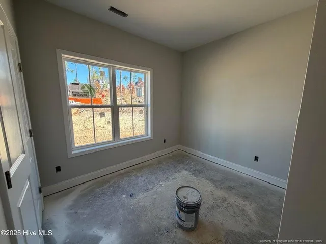 a view of empty room with windows