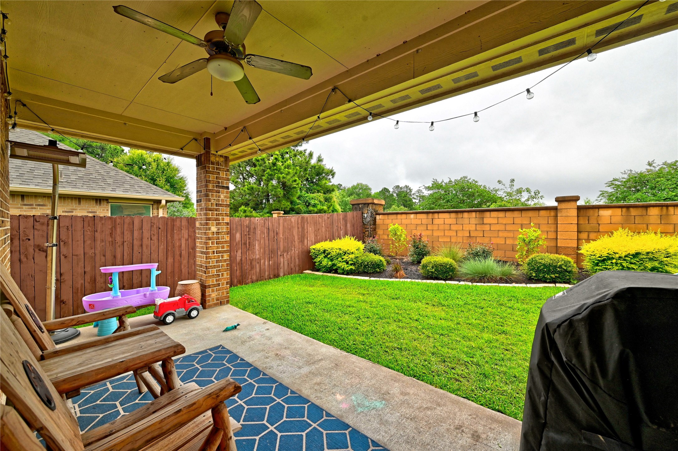 23118 Southern Brk Trail Spring, TX 77389 - Photo 40 of 50 Large covered patio with tons of privacy in the backyard. Beautiful landscaping...
