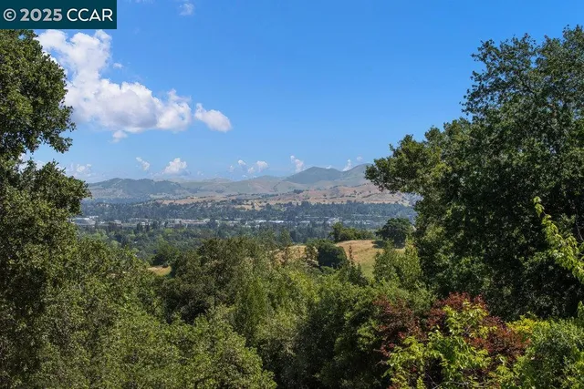 a view of lake and mountain