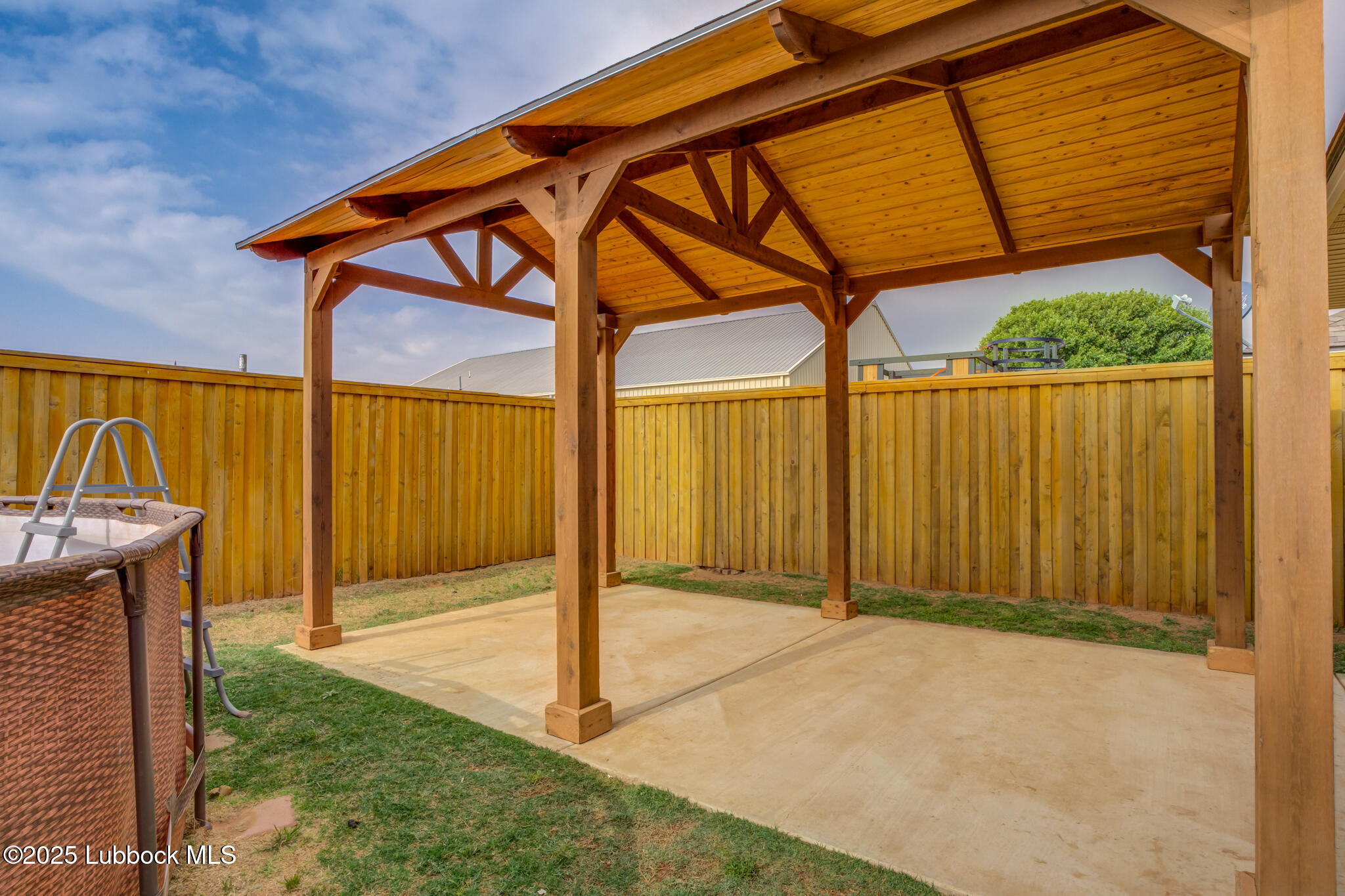 6223 18th Street Lubbock, TX 79416 - Photo 29 of 29 a backyard view of a house
