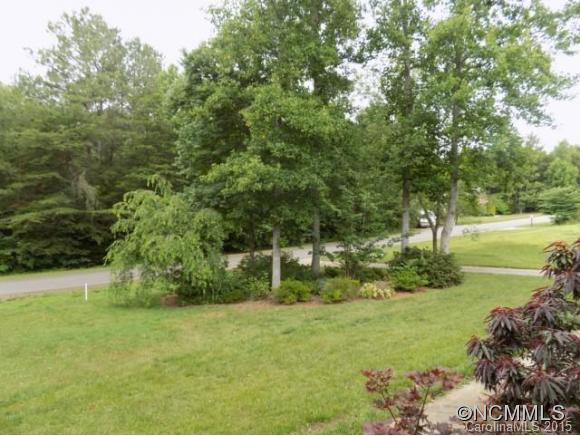 418 Chisholm Trail Rutherfordton, NC 28139 - Photo 15 of 22 a view of a field with an trees